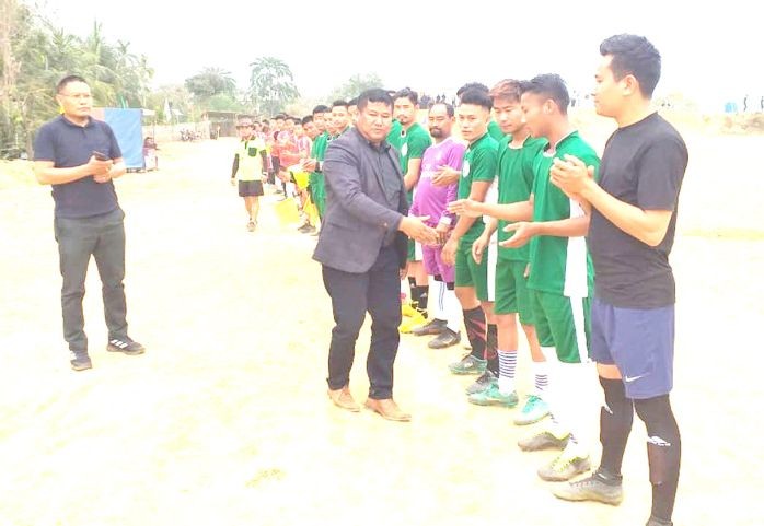 Wokha DC Orenthung Lotha with the men’s teams before the football final match at the inter-departmental sports meet in Bhabdari on February 25. (DIPR Photo)